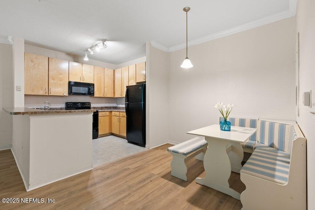 12700 Bartram Park Blvd Unit 1911, Jacksonville, FL 32258 - kitchen featuring black appliances, light brown cabinets, light wood-style floors, a peninsula, and crown molding
