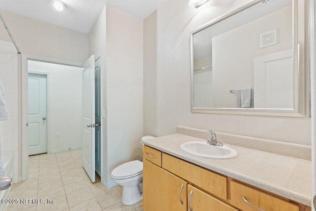 12700 Bartram Park Blvd Unit 1911, Jacksonville, FL 32258 - full bath featuring toilet, tile patterned floors, vanity, and a shower