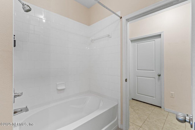 12700 Bartram Park Blvd Unit 1911, Jacksonville, FL 32258 - full bathroom featuring bathtub / shower combination, tile patterned floors, and baseboards