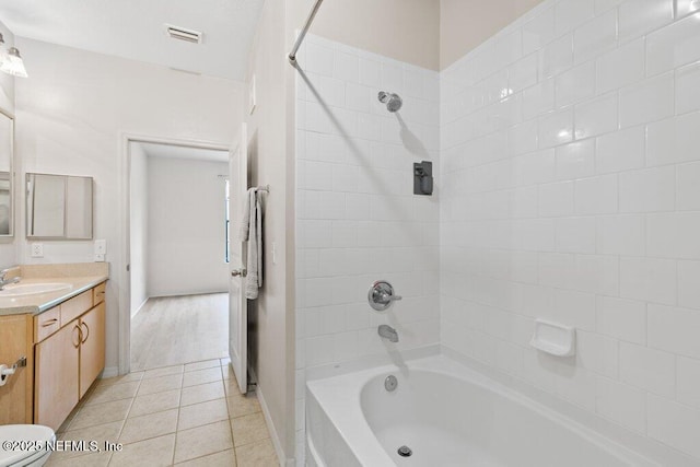 12700 Bartram Park Blvd Unit 1911, Jacksonville, FL 32258 - full bathroom with vanity, shower / washtub combination, tile patterned floors, toilet, and baseboards