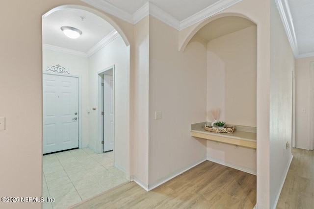 12700 Bartram Park Blvd Unit 1911, Jacksonville, FL 32258 - corridor featuring ornamental molding, wood finished floors, arched walkways, and baseboards