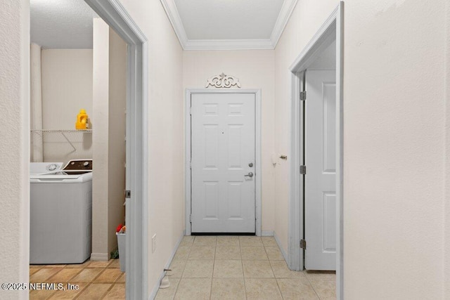 12700 Bartram Park Blvd Unit 1911, Jacksonville, FL 32258 - hallway with washer / dryer, crown molding, light tile patterned floors, and baseboards