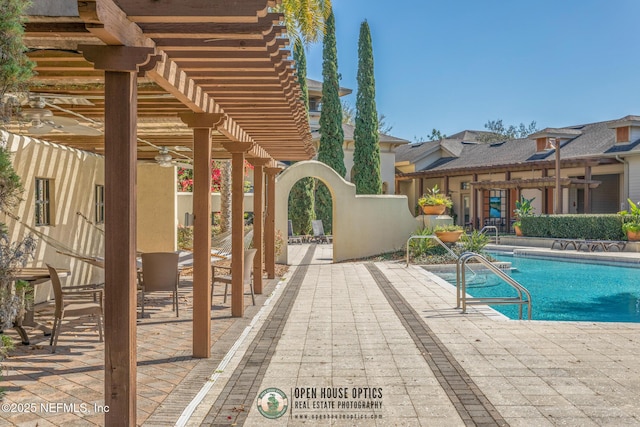 12700 Bartram Park Blvd Unit 1911, Jacksonville, FL 32258 - community pool with a patio area and ceiling fan