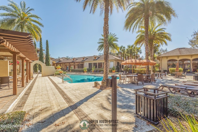 12700 Bartram Park Blvd Unit 1911, Jacksonville, FL 32258 - community pool featuring a patio area and a pergola