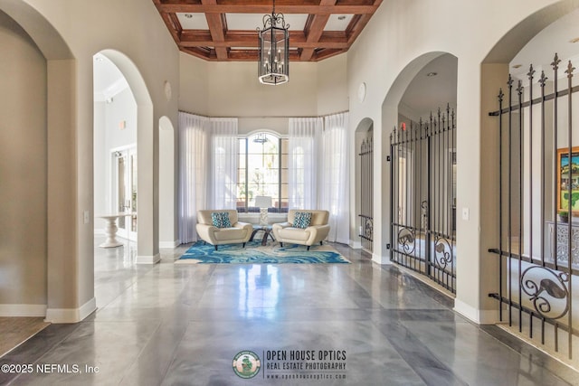 12700 Bartram Park Blvd Unit 1911, Jacksonville, FL 32258 - foyer featuring a towering ceiling, baseboards, beamed ceiling, coffered ceiling, and french doors