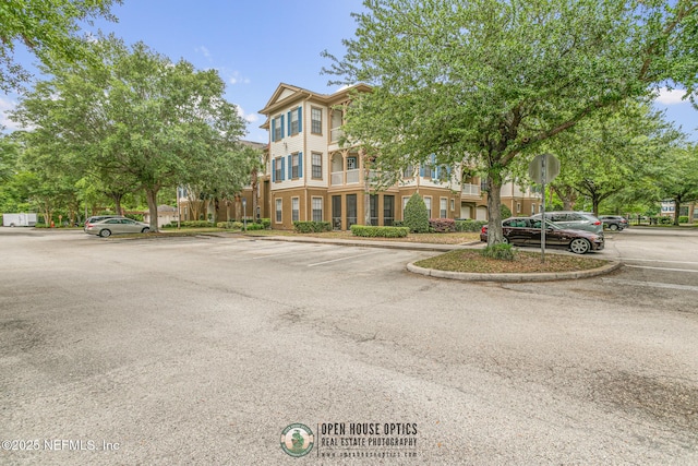 12700 Bartram Park Blvd Unit 1911, Jacksonville, FL 32258 - view of building exterior featuring uncovered parking