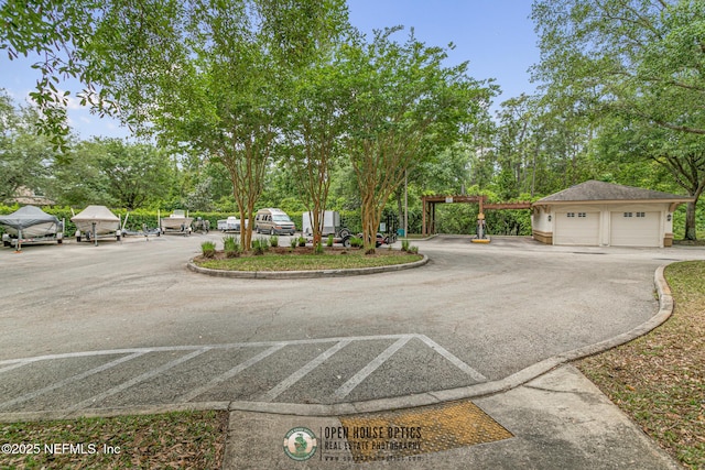 12700 Bartram Park Blvd Unit 1911, Jacksonville, FL 32258 - view of asphalt road with view of wooded area