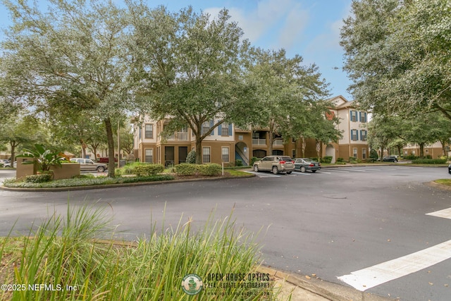 12700 Bartram Park Blvd Unit 1911, Jacksonville, FL 32258 - view of asphalt street featuring curbs and a residential view