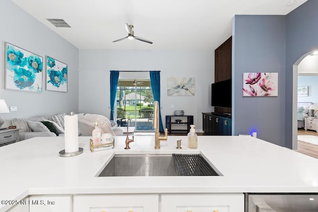 1252 Paradise Pond Rd, Saint Augustine, FL 32092 - kitchen with a sink, open floor plan, ceiling fan, and light countertops