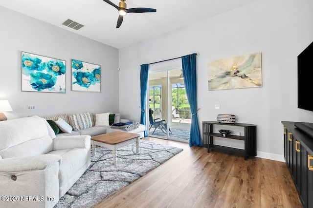 1252 Paradise Pond Rd, Saint Augustine, FL 32092 - living room featuring a ceiling fan, wood finished floors, and baseboards