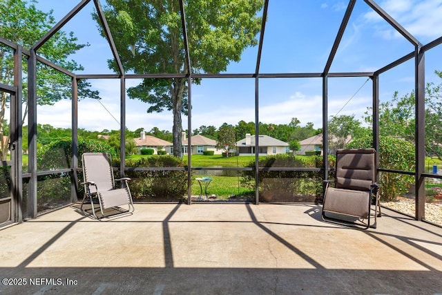 1252 Paradise Pond Rd, Saint Augustine, FL 32092 - unfurnished sunroom featuring a residential view