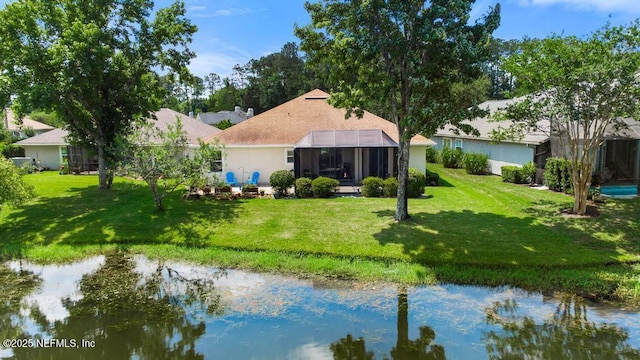 1252 Paradise Pond Rd, Saint Augustine, FL 32092 - back of property featuring a yard and a water view