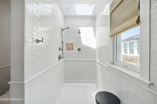 816 Ocean Front, Neptune Beach, FL 32266 - full bathroom featuring a tile shower and a skylight