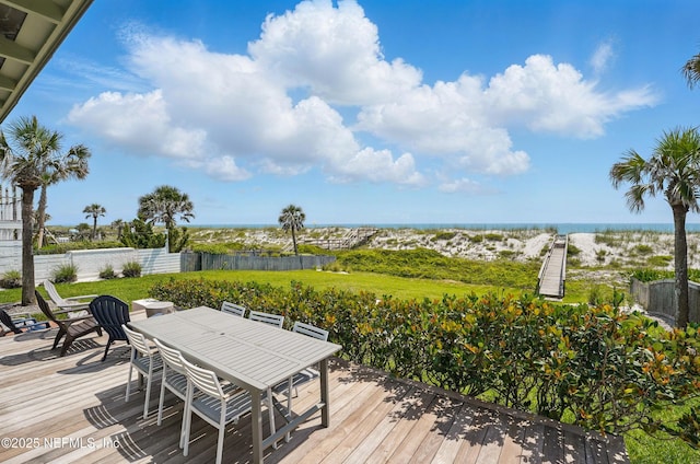 816 Ocean Front, Neptune Beach, FL 32266 - wooden terrace with outdoor dining area and a water view