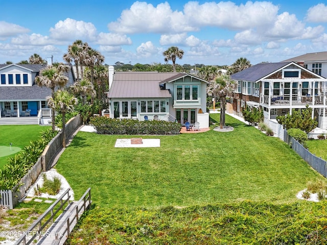 816 Ocean Front, Neptune Beach, FL 32266 - back of house with a patio, french doors, and metal roof