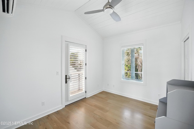 816 Ocean Front, Neptune Beach, FL 32266 - unfurnished room with healthy amount of natural light, ceiling fan, wood finished floors, baseboards, and vaulted ceiling