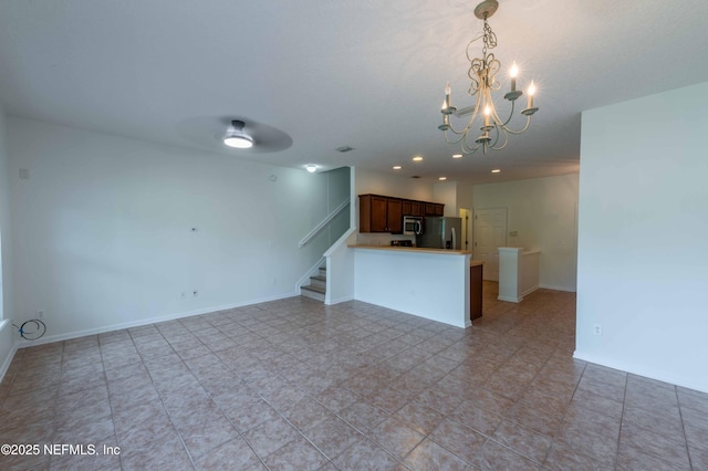 1843 Biscayne Bay Cir, Jacksonville, FL 32218 - unfurnished living room featuring a chandelier, stairs, baseboards, and recessed lighting