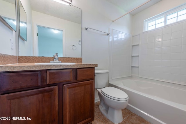 1843 Biscayne Bay Cir, Jacksonville, FL 32218 - bathroom featuring toilet, vanity, tile patterned flooring, and tub / shower combination