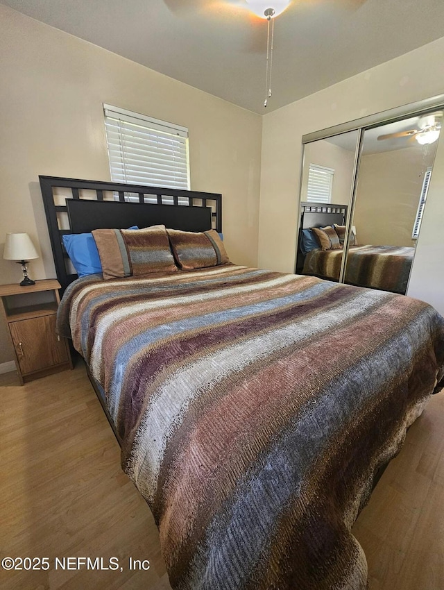 104 Palm Dr, Georgetown, FL 32139 - bedroom with light wood-style floors and a closet