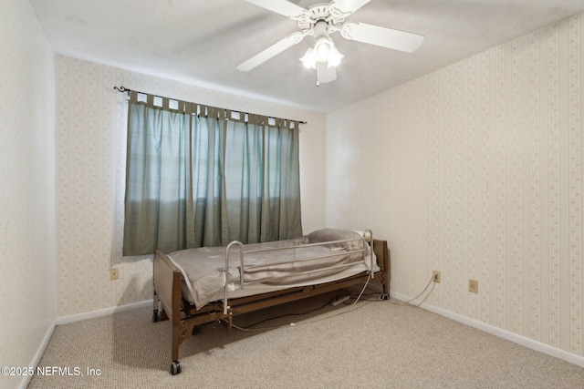 1073 Grove Park Ln, Orange Park, FL 32073 - carpeted bedroom with ceiling fan and baseboards