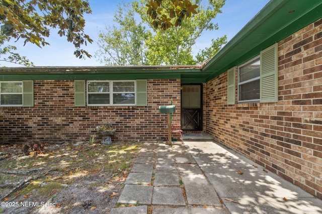 1073 Grove Park Ln, Orange Park, FL 32073 - entrance to property with a patio and brick siding