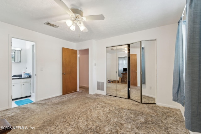 1073 Grove Park Ln, Orange Park, FL 32073 - unfurnished bedroom featuring carpet flooring, baseboards, a closet, and ensuite bath