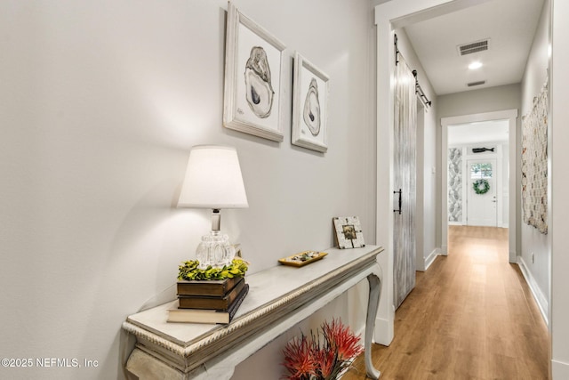 1787 Azalea St, Fernandina Beach, FL 32034 - hall with light wood finished floors, baseboards, and recessed lighting