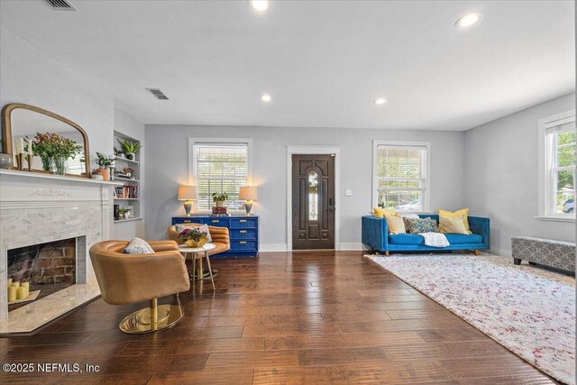 4371 Gadsden Ct, Jacksonville, FL 32207 - living area with recessed lighting, a high end fireplace, hardwood / wood-style flooring, and baseboards