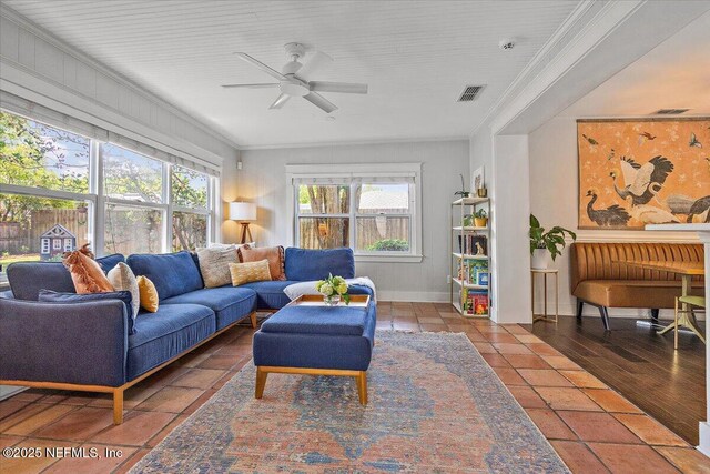 4371 Gadsden Ct, Jacksonville, FL 32207 - living room featuring healthy amount of natural light, ceiling fan, baseboards, and ornamental molding