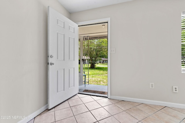 602 Luna Ct, Jacksonville, FL 32205 - foyer with baseboards and light tile patterned floors