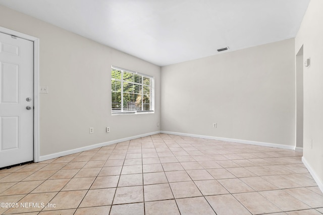 602 Luna Ct, Jacksonville, FL 32205 - empty room featuring light tile patterned floors and baseboards