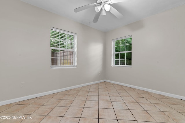 602 Luna Ct, Jacksonville, FL 32205 - empty room with a ceiling fan and baseboards