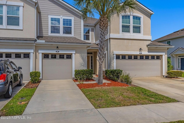 287 Richmond Dr, Saint Johns, FL 32259 - multi unit property with driveway, an attached garage, and stucco siding