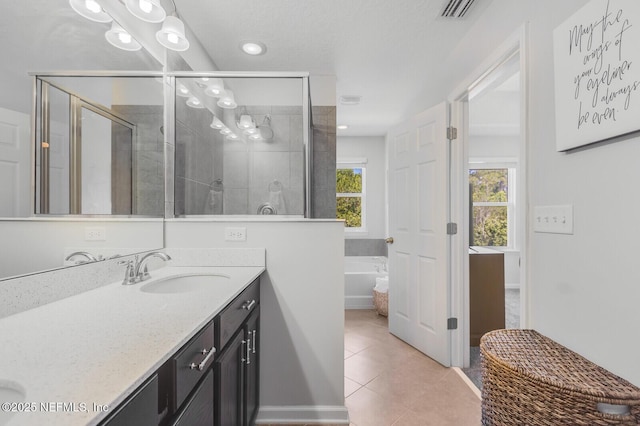 287 Richmond Dr, Saint Johns, FL 32259 - bathroom featuring double vanity, a garden tub, a shower stall, and tile patterned floors