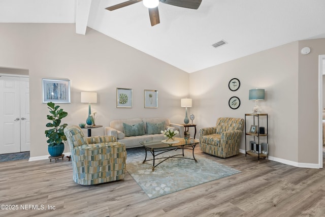 1500 Marsh Rabbit Way, Fleming Island, FL 32003 - living area with wood finished floors, a ceiling fan, beam ceiling, baseboards, and high vaulted ceiling