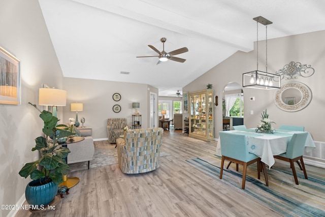 1500 Marsh Rabbit Way, Fleming Island, FL 32003 - living room with ceiling fan, wood finished floors, arched walkways, and baseboards