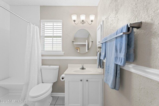 1500 Marsh Rabbit Way, Fleming Island, FL 32003 - bathroom featuring vanity, toilet, tile patterned flooring, and curtained shower
