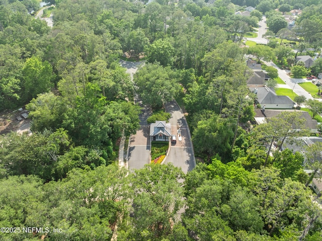 1500 Marsh Rabbit Way, Fleming Island, FL 32003 - aerial view of property and surrounding area featuring a heavily wooded area