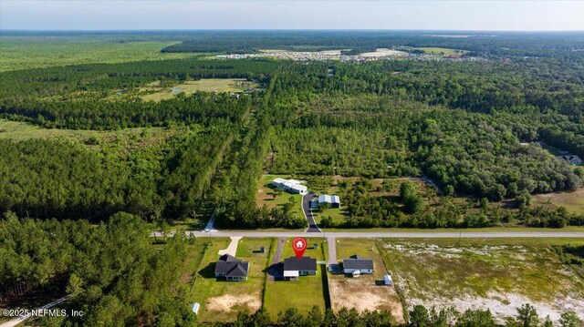 5801 SE County Road 21b, Keystone Heights, FL 32656 - aerial view of property's location with a heavily wooded area