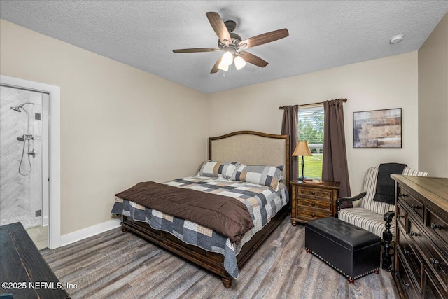 5801 SE County Road 21b, Keystone Heights, FL 32656 - bedroom with a textured ceiling, baseboards, a ceiling fan, and wood finished floors