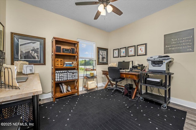 5801 SE County Road 21b, Keystone Heights, FL 32656 - home office featuring a ceiling fan, baseboards, wood finished floors, and a textured ceiling