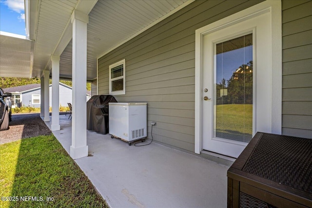 5801 SE County Road 21b, Keystone Heights, FL 32656 - view of patio featuring grilling area