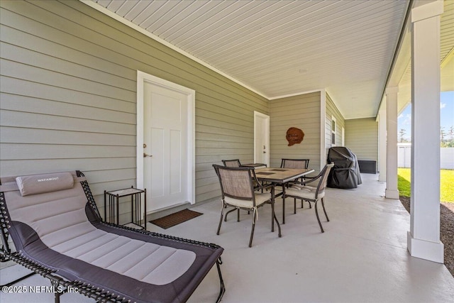 5801 SE County Road 21b, Keystone Heights, FL 32656 - view of patio / terrace featuring outdoor dining area and a grill