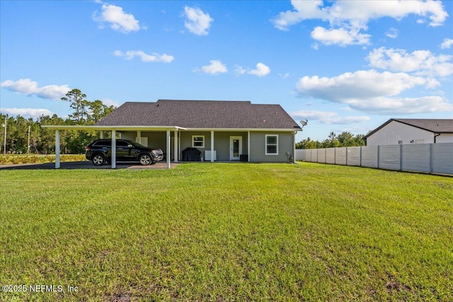 5801 SE County Road 21b, Keystone Heights, FL 32656 - rear view of house with an attached carport