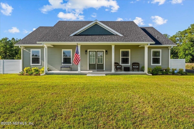 5801 SE County Road 21b, Keystone Heights, FL 32656 - view of front of home featuring a shingled roof, covered porch, and french doors