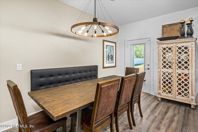 5801 SE County Road 21b, Keystone Heights, FL 32656 - dining room featuring dark wood-style flooring and a chandelier