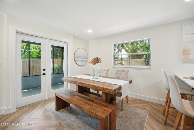 1233 Boca Grande Ave, Jacksonville, FL 32233 - dining area featuring french doors, healthy amount of natural light, recessed lighting, and baseboards