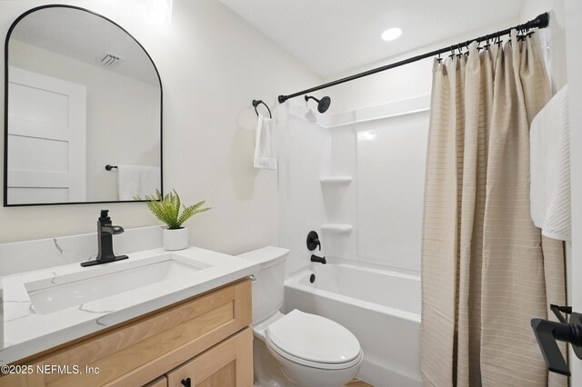 1233 Boca Grande Ave, Jacksonville, FL 32233 - bathroom with toilet, shower / bath combo with shower curtain, and vanity