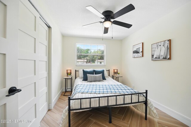 1233 Boca Grande Ave, Jacksonville, FL 32233 - bedroom with baseboards, wood finished floors, and ceiling fan