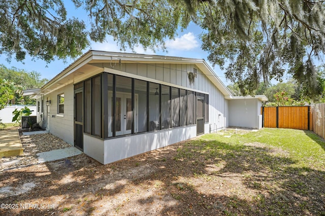 1233 Boca Grande Ave, Jacksonville, FL 32233 - view of home's exterior featuring a sunroom